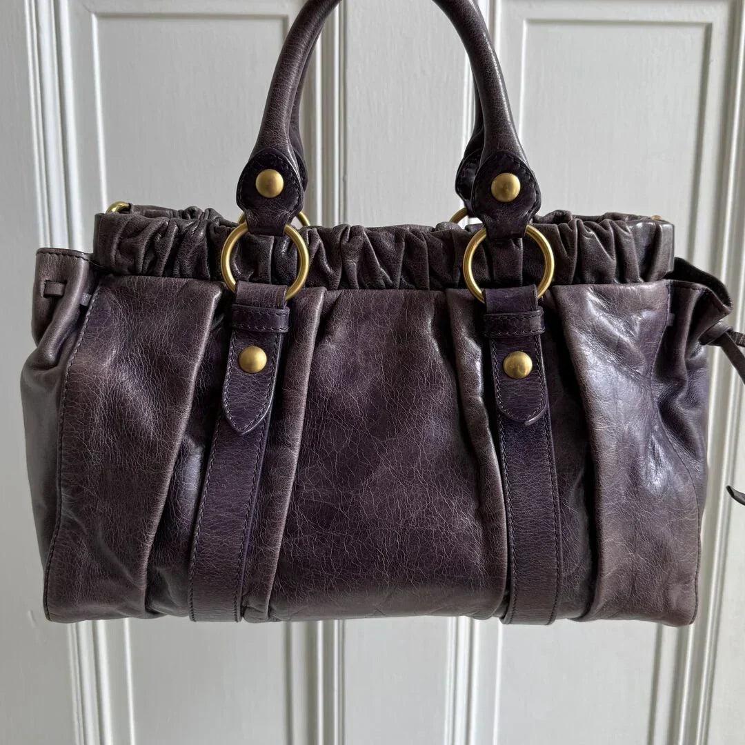 PreOwned Miu Miu Vitello Purple Leather Handbag